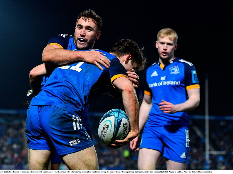 Rob Russell of Leinster celebrates with teammate Jordan Larmour, left, after scoring their side's fourth try during the United Rugby Championship between Leinster and Connacht at RDS Arena in Dublin. Photo by Ben McShane/Sportsfile