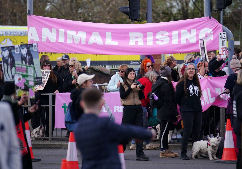 Animal Rising activists protested outside the track (Peter Byrne/PA)