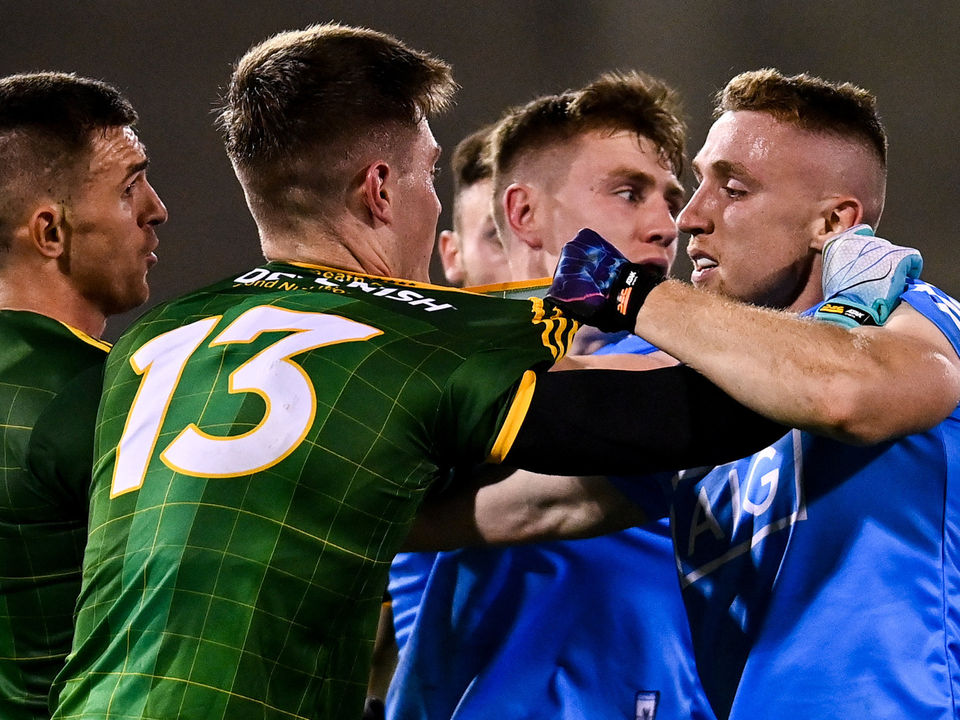 Thomas O’Reilly of Meath and Dublin’s Paddy Small get acquainted. Photo: Ramsey Cardy/Sportsfile