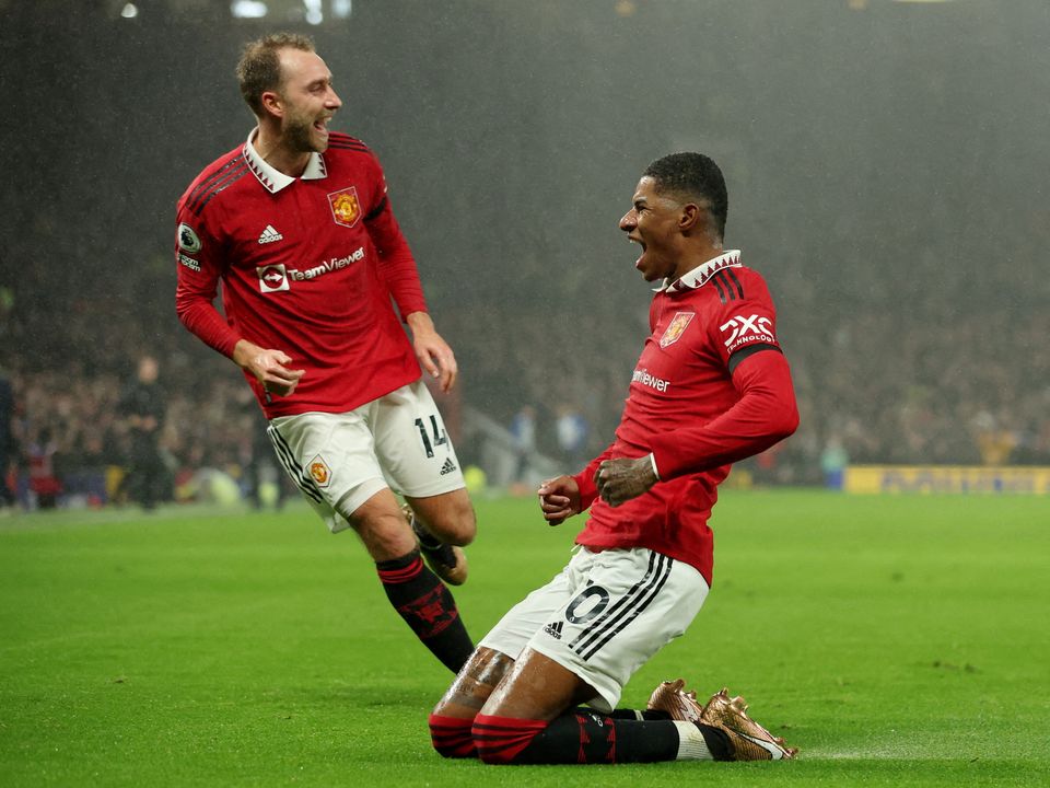 Manchester United's Marcus Rashford celebrates scoring their first goal with Christian Eriksen. REUTERS/Phil Noble