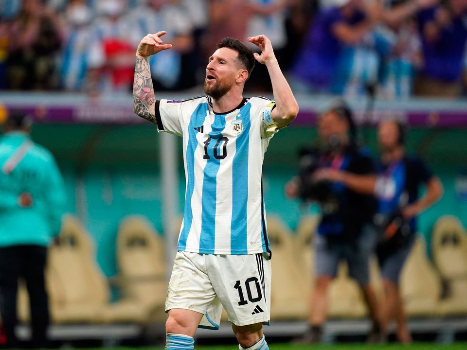 Argentina's Lionel Messi celebrates his sides victory in the penalty shoot out following the FIFA World Cup Quarter-Final match at the Lusail Stadium