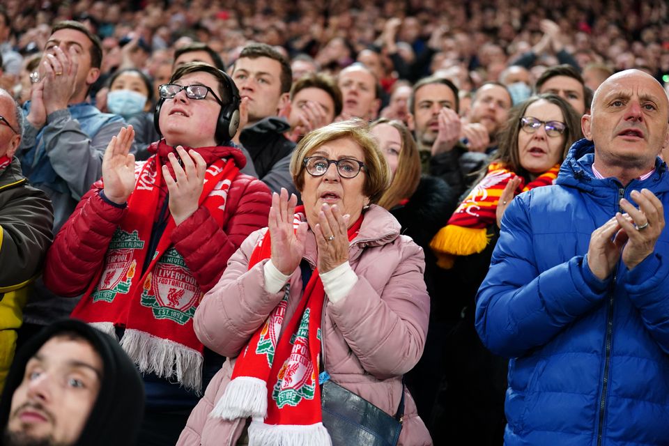 Liverpool fans clap in the seventh minute as a mark of respect to Cristiano Ronaldo (Mike Egerton/PA)