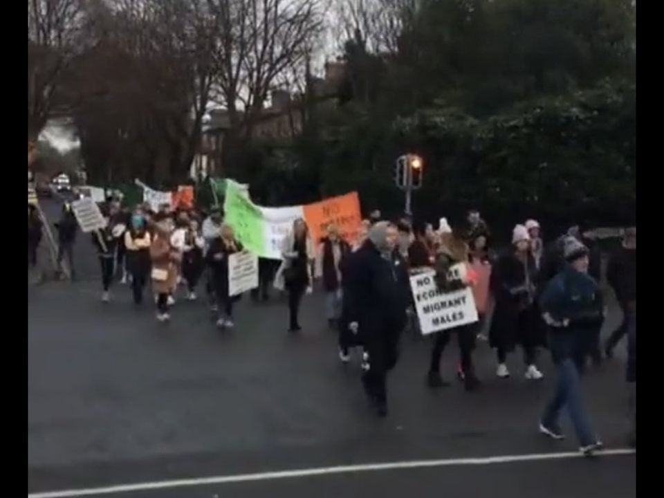 Asylum seeker protesters walking through Ballsbridge