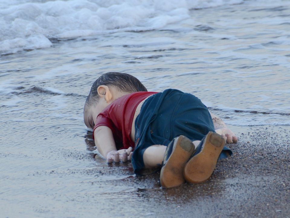 Aylan Shenu lies on the shores in Bodrum, southern Turkey, on September 2, 2015