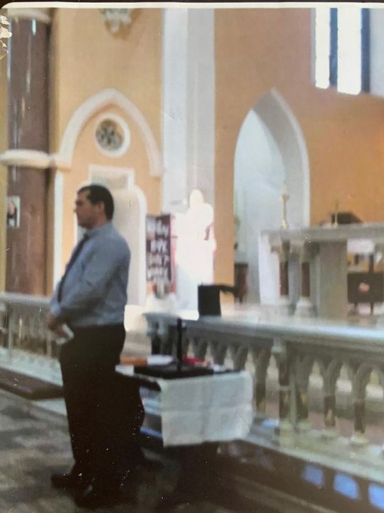 A bright light, which some believe to be an apparition of the dead Italian saint Padre Pio, photographed during a mass held in St Saviour’s Church, Limerick, on September 23, 2018, marking the 50th anniversary of the death of Saint Padre Pio. Will Stokes, Limerick, who was volunteering on the day, appears in the foreground of the photograph. Two women have said they saw the photograph, which was erected in St Saviour’s Church last Friday, marking the 52nd anniversary of the saint’s death, change colour and reveal St Pio in a brown coloured habit.