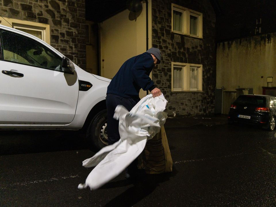 A member of the Garda Technical Bureau at the scene where a man died in Blacklion, Co Cavan. Picture: Ronan McGrade