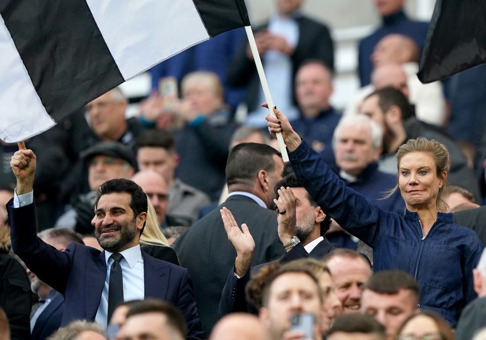 Newcastle chairman Yasir Al-Rumayyan (centre) and directors Amanda Staveley (right) and Mehrdad Ghodoussi (left) at St James’ Park (Owen Humphreys/PA)