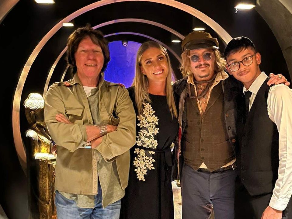 Johnny Depp (third left), with Jeff Beck (right) and members of staff at Birmingham curry house Varanasi. (Mo Hussain/Varanasi)