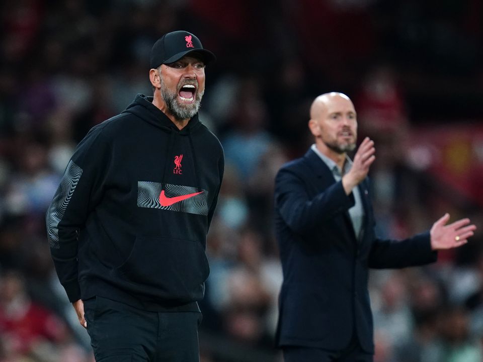Liverpool manager Jurgen Klopp (left) and Manchester United manager Erik ten Hag on the touchline during the Premier League match at Old Trafford, Manchester. Picture date: Monday August 22, 2022.