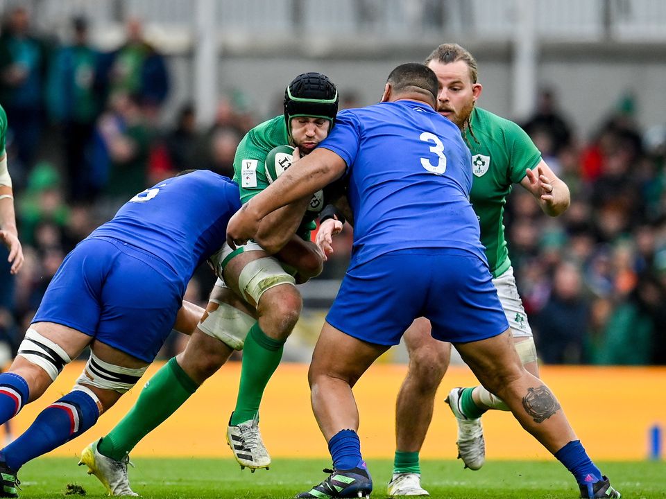Caelan Doris, tackled by Paul Willemse, left, and Uini Atonio, was man of the match for Ireland against France. Photo: Seb Daly/Sportsfile