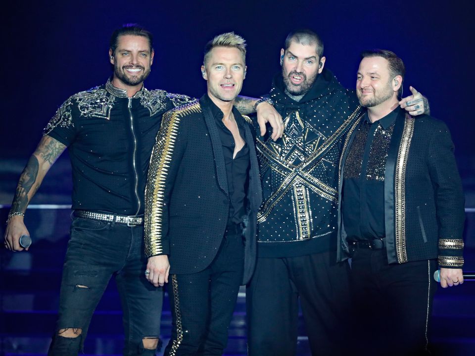 Boyzone in concert - Belfast...EDITORIAL USE ONLY 
(left to right) Keith Duffy, Ronan Keating, Shane Lynch and Mikey Graham of Boyzone on stage at the SSE Arena, Belfast, as part of the band's Thank You & Goodnight farewell tour. PRESS ASSOCIATION Photo. Picture date: Wednesday January 23, 2019. Photo credit should read: Niall Carson/PA Wire...E