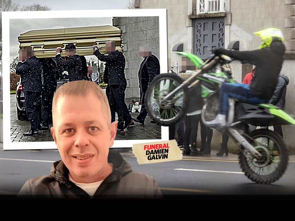 A motorcyclist performs wheelies outside the church as Damien Galvin is laid to rest
