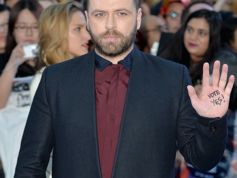 Mark Feehily in 2015 with'Vote Yes' written on his hand for the gay marriage referendum.