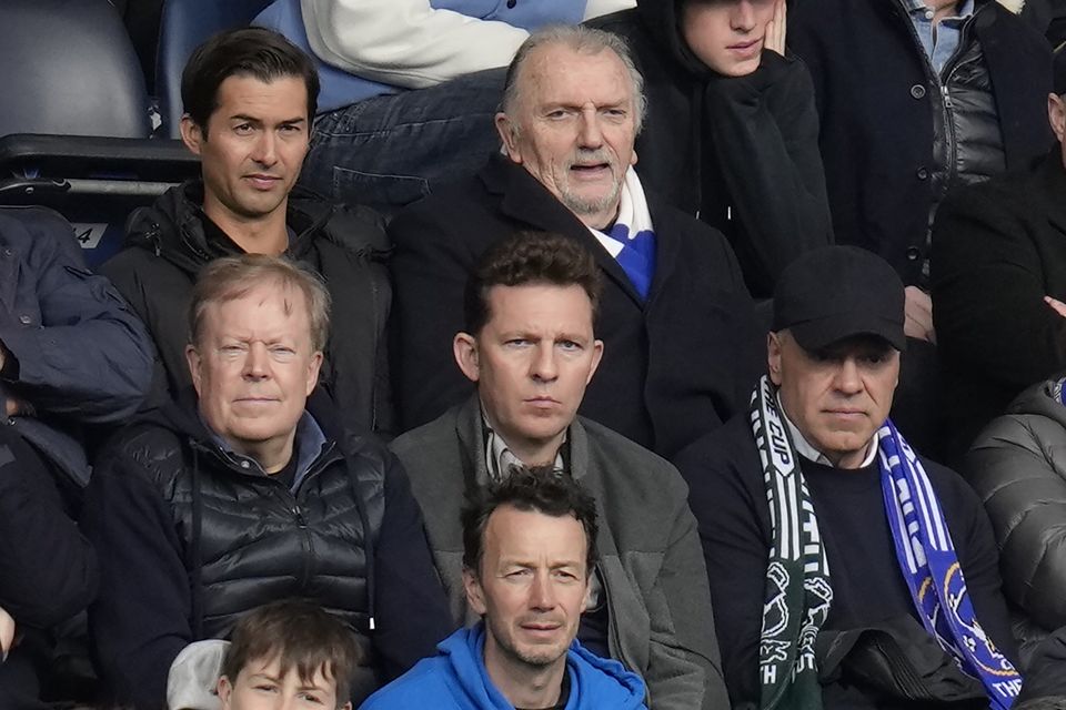 Businessman Nick Candy, centre, was in attendance for the match against Newcastle (Kirsty Wigglesworth/AP)