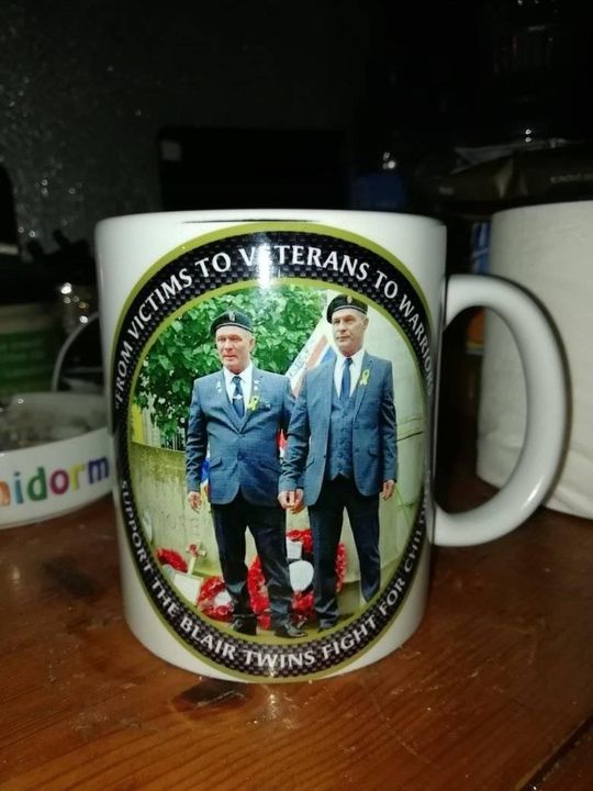 The Blair Twins have placed photos of themselves on mugs when at remembrance day parade