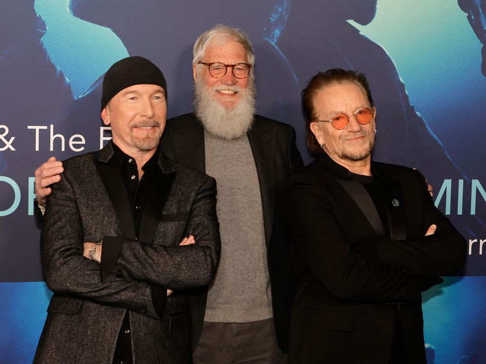 The Edge, Dave Letterman and Bono appear at the Los Angeles premiere of the Disney+ Music Docu-Special "Bono & The Edge: A Sort Of Homecoming, with Dave Letterman" at The Orpheum Theatre on March 08, 2023 in Los Angeles, California. (Photo by Kevin Winter/Getty Images)