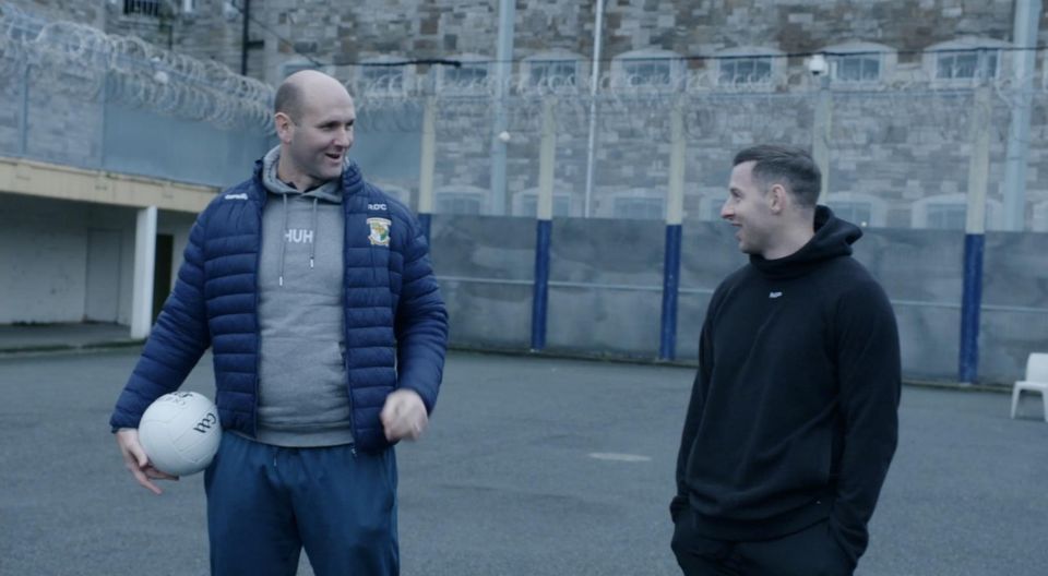 Comedian Rory O’Connor and All-Ireland star Philly McMahon in Mountjoy Prison to train and motivate the players ahead of their match against the wardens