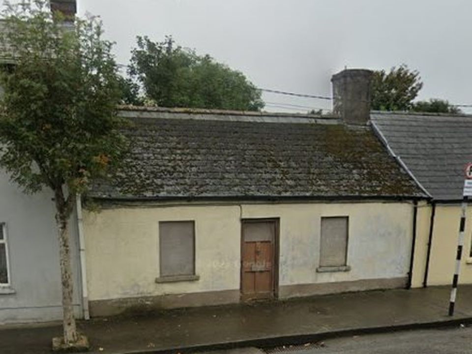 It is believed the man’s remains may have lain undiscovered in the boarded-up house on Mallow’s Beecher St (above) for up to 20-years
