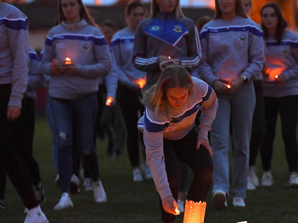Candles are lit for at the vigil for Kate Moran. Picture: Ray Ryan
