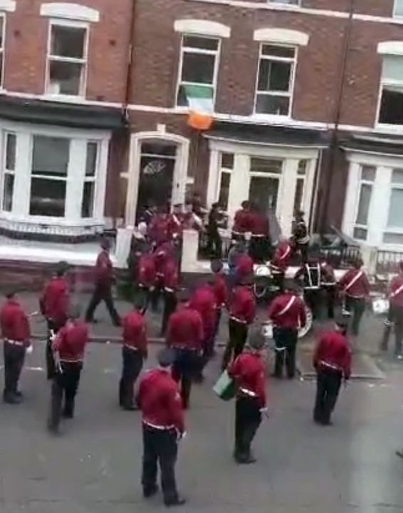 An Orange flute band had a bin hurled at them while marching through Agincourt Avenue on the 12th of July.