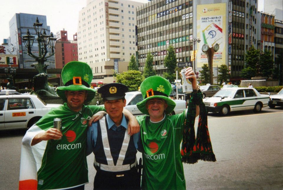 Tony Considine with a Japanese traffic cop before Ireland's group game with Saudi Arabia