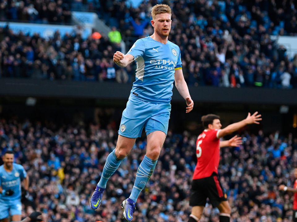 Kevin De Bruyne celebrates after scoring their sides second goal during the Premier League match between Manchester City and Manchester United at Etihad Stadium. (Photo by Michael Regan/Getty Images)