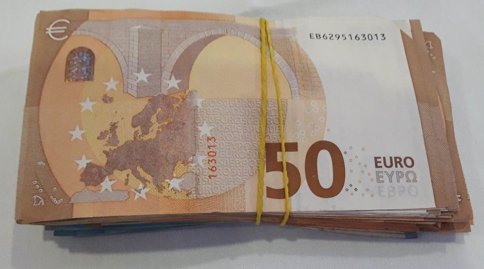 Bundle of €50 notes hidden by girlfriend