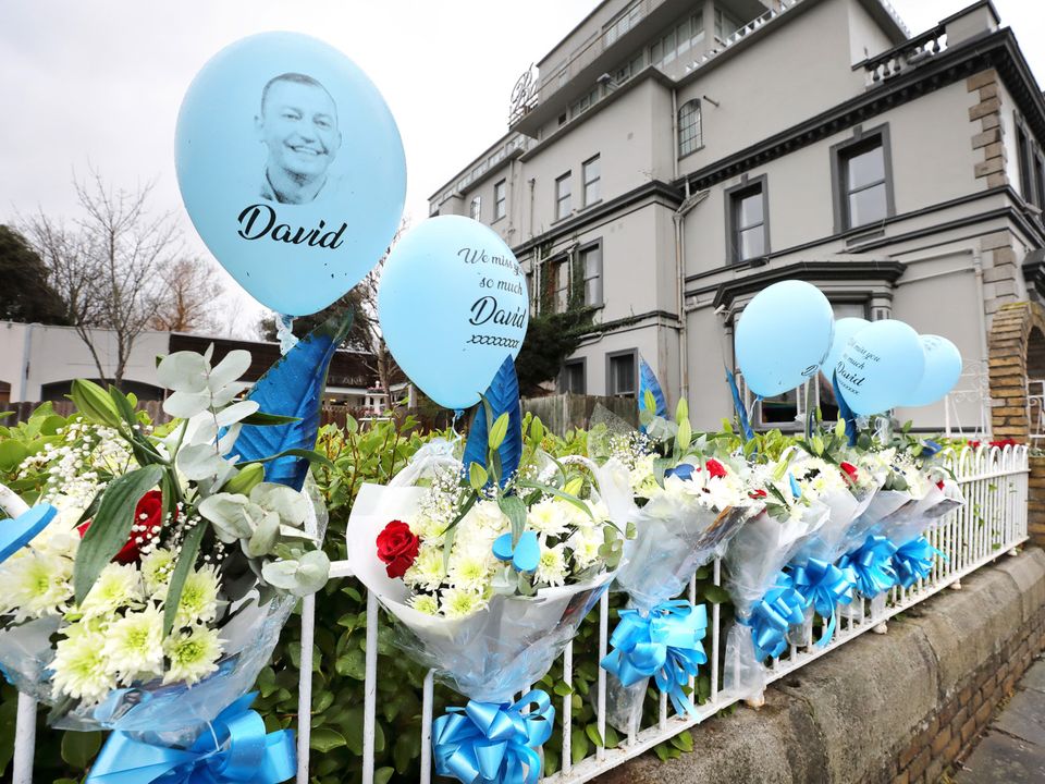 Flowers and balloons form a memorial to David Byrne outside the Regency [now Bonnington] Hotel where he was shot dead six years ago.