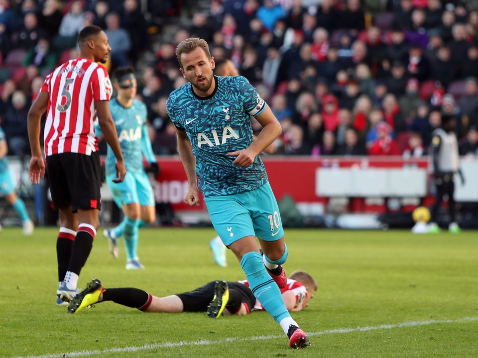 Tottenham Hotspur's Harry Kane celebrates scoring his sides first goal during the Premier League match at the Gtech Community Stadium, London. Picture date: Monday December 26, 2022.