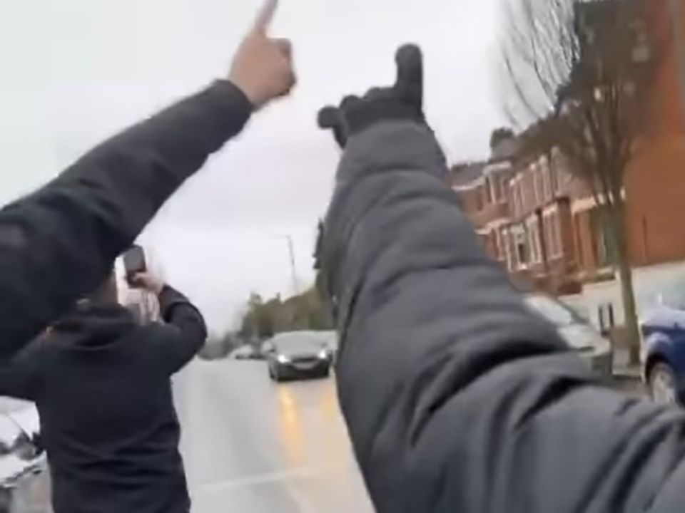 Coleraine FC fan who call themselves Ulster Ultras video themselves walking along the Cliftonville road, for a game against Cliftonville, in Belfast singing the sash.