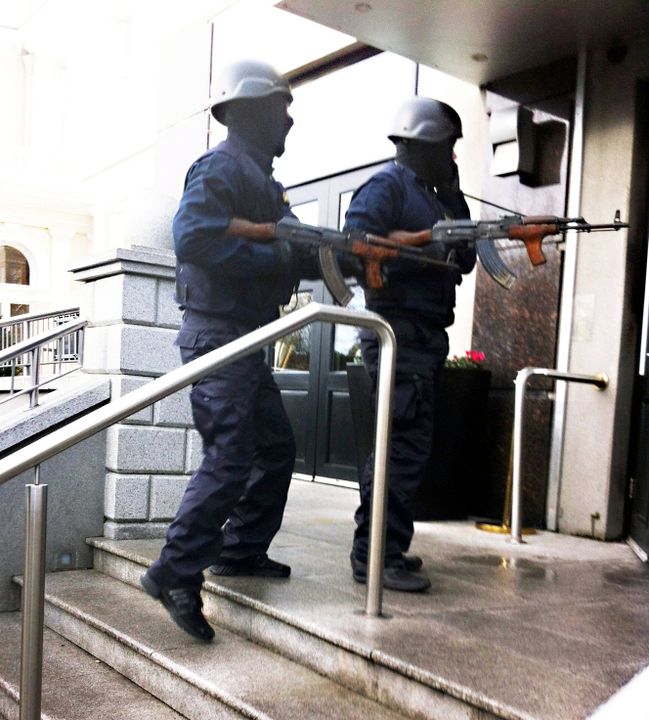 Gunmen enter the Regency Hotel ahead of the attack in 2016