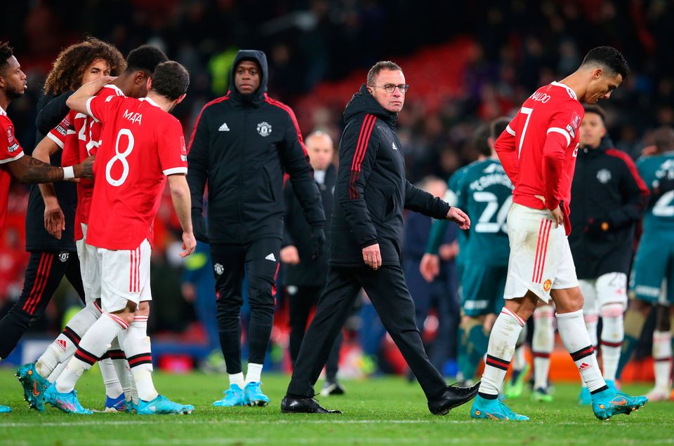 Manchester United manager Ralf Rangnick and Cristiano Ronaldo leave the pitch after losing the penalty shoot out during the Emirates FA Cup fourth round tie at Old Trafford. (Photo by Alex Livesey/Getty Images)