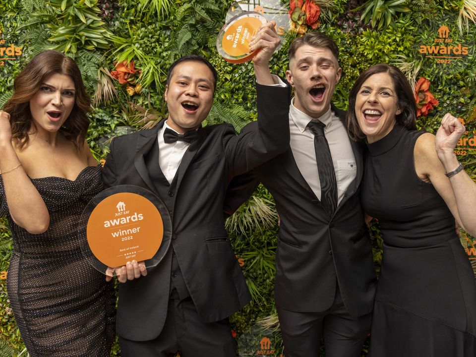 (L-R) Host Muireann O’Connell and ‘Best of Ireland’ and ‘Best of Munster’ winners, Gary Huynh and Donnacha Cregan-Nolan from Sambros in Limerick, and Amanda Roche-Kelly, Managing Director of Just Eat Ireland  at the Just Eat awards. Photo: Allen Kiely