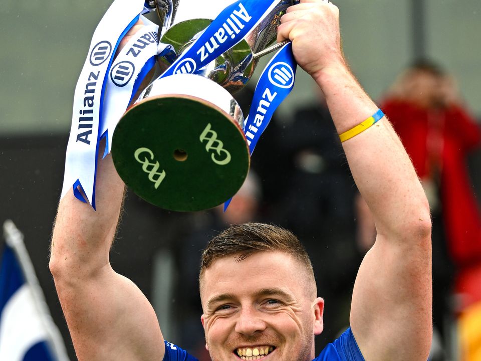1 April 2023; Matthew Hynes of Cavan lifts the cup after the Allianz Hurling League Division 3B Final match between Cavan and Leitrim at GAA National Games Development Centre in Sport Ireland Campus in Dublin. Photo by David Fitzgerald/Sportsfile