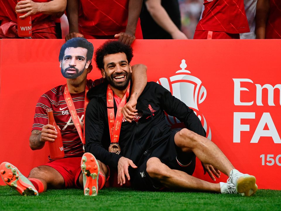 Thiago Alcantara and Mohamed Salah of Liverpool celebrate after their sides victory during The FA Cup Final . (Photo by Shaun Botterill/Getty Images)