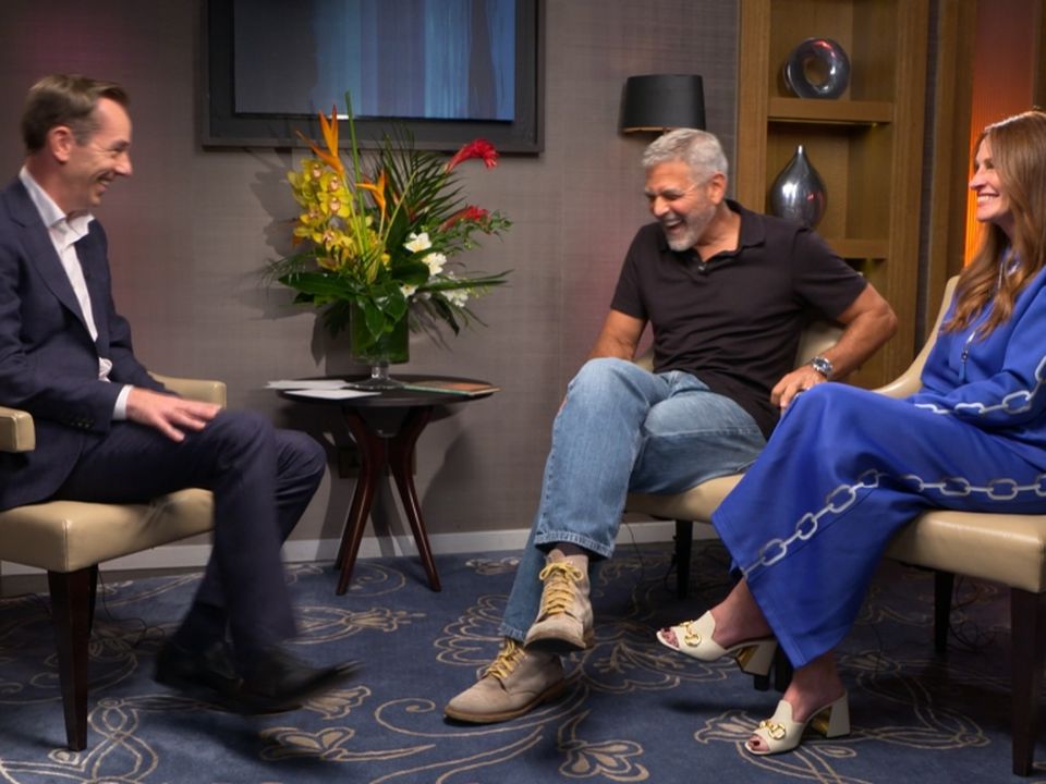 Ryan Tubridy with Late Late Show guests, George Clooney and Julia Roberts. Photo: RTE