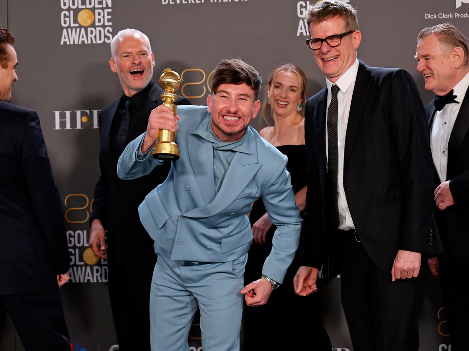 BEVERLY HILLS, CALIFORNIA - JANUARY 10: (L-R) Colin Farrell, Martin McDonagh, Barry Keoghan, Kerry Condon, Graham Broadbent, and Brendan Gleeson, winners of Best Picture - Musical/Comedy for "The Banshees of Inisherin", pose in the press room during the 80th Annual Golden Globe Awards at The Beverly Hilton on January 10, 2023 in Beverly Hills, California. (Photo by Amy Sussman/Getty Images)