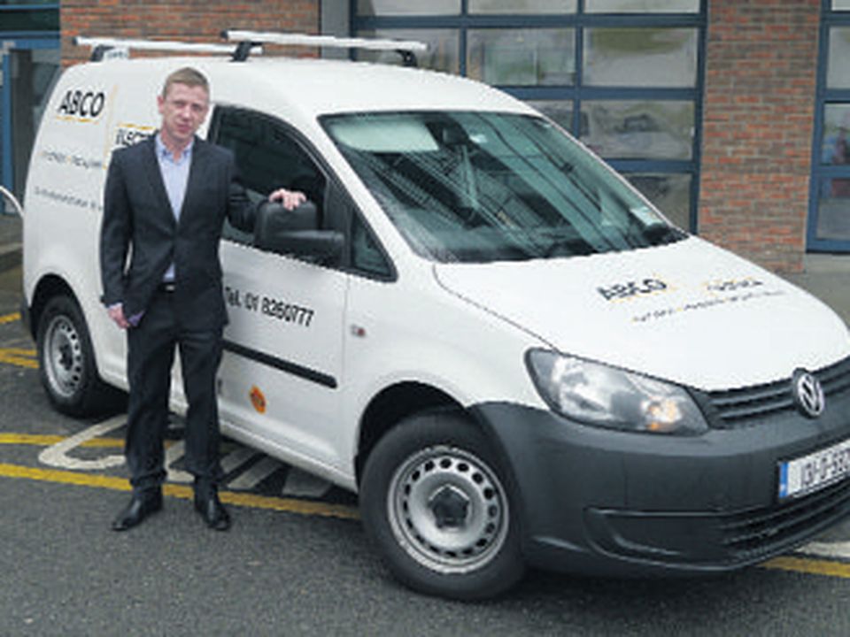 Jonathan Dowdall in front of one of his ABCO vans