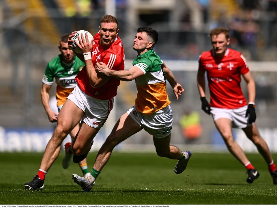 30 April 2023; Conor Grimes of Louth in action against Ruairi McNamee of Offaly during the Leinster GAA Football Senior Championship Semi Final match between Louth and Offaly at Croke Park in Dublin. Photo by Ben McShane/Sportsfile