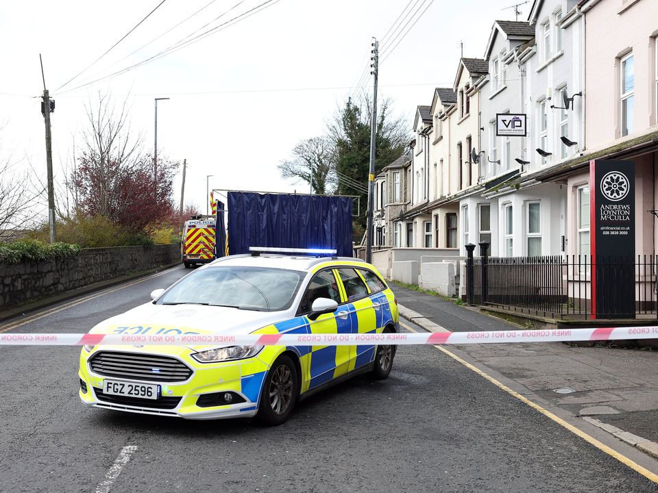 The scene on Church Street in Portadown where police are investigating the circumstances surrounding the death of a woman.