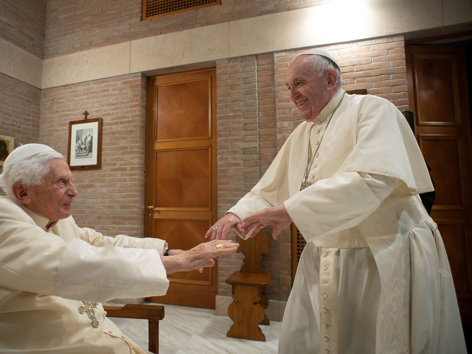 Pope Francis greets Pope Emeritus Benedict XVI in 2020. Photo: Vatican Media
