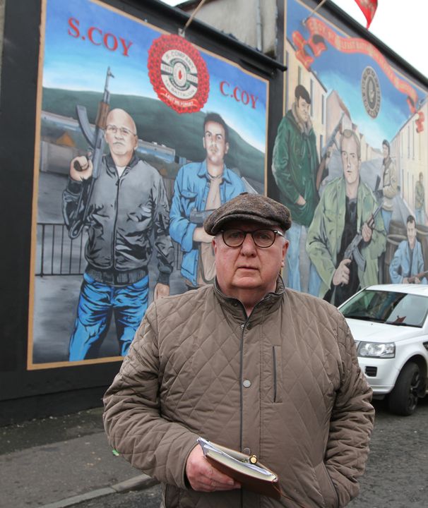 Reporter Hugh Jordon at the Joe Coggle and fellow UVF member Paul McClelland depicted in the new mural on the Shankill Road