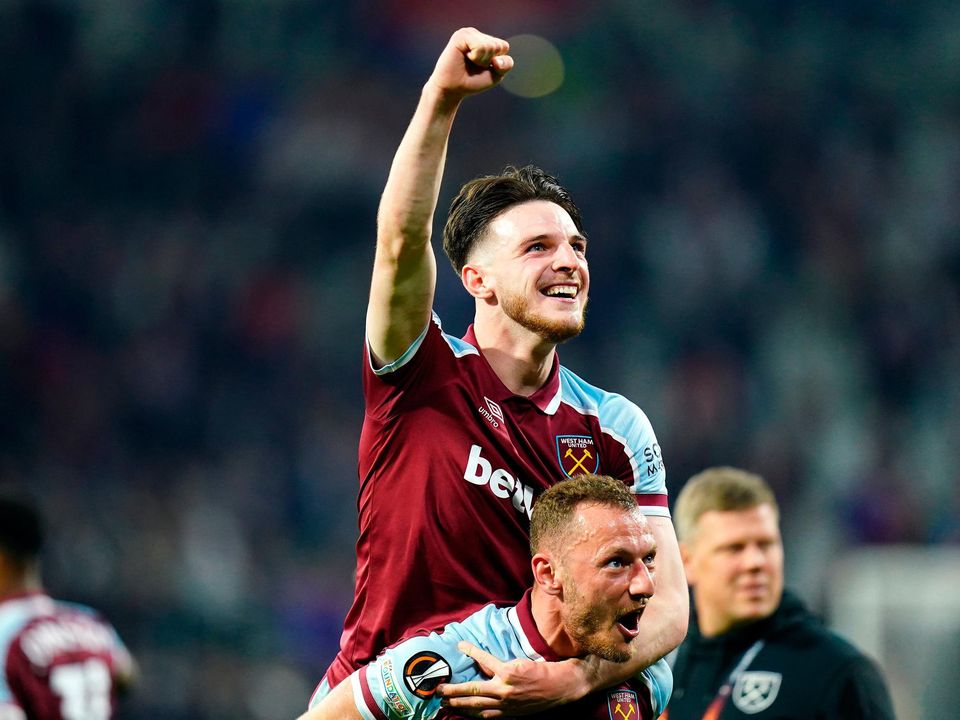 West Ham United's Declan Rice (top) celebrates with team-mate Vladimir Coufal. Photo credit: Adam Davy/PA Wire.