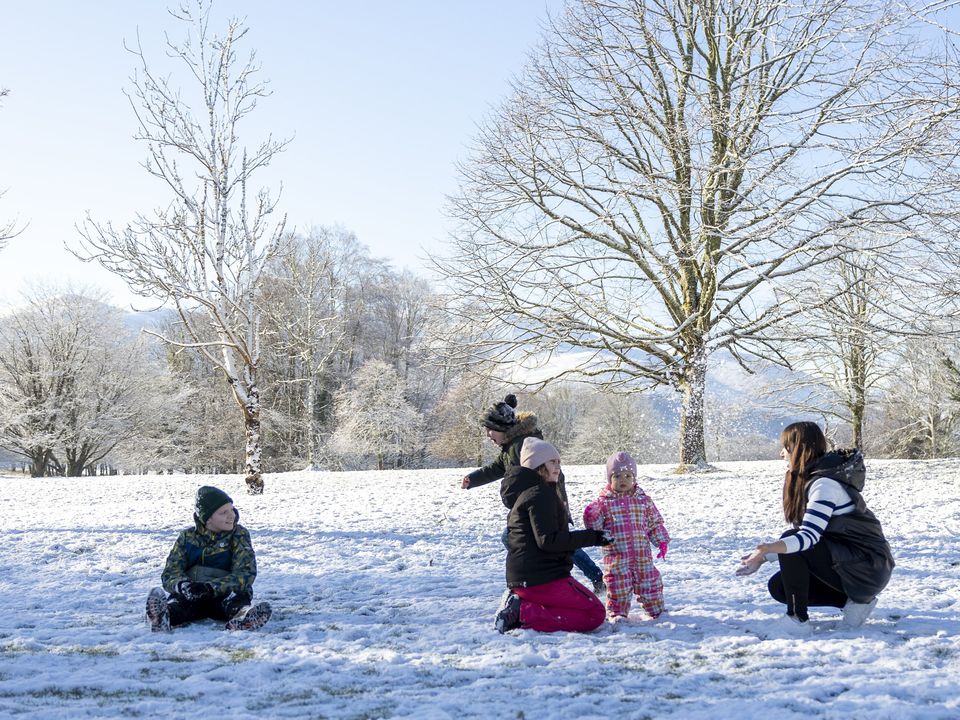 Children enjoying the snow in Killarney, Co Kerry. Photo: Tatyana McGough