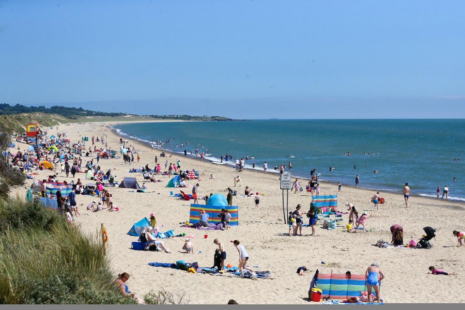 People enjoying the sunny weather at Brittas Bay beach, Co Wicklow, last month. Photo: Gerry Mooney