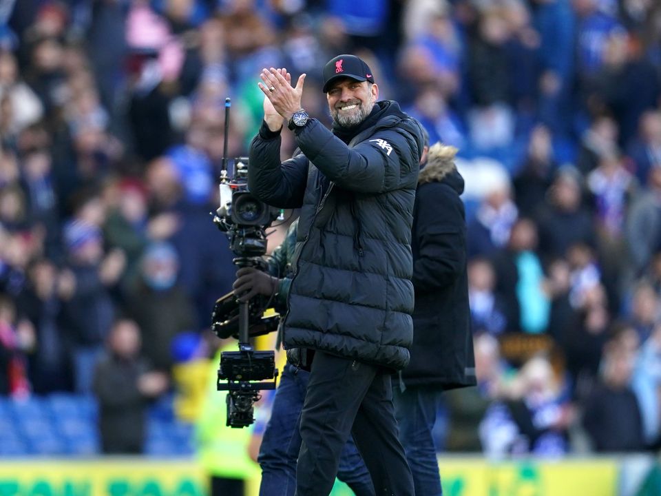 Liverpool manager Jurgen Klopp applauds the fans after the win at Brighton (PA)