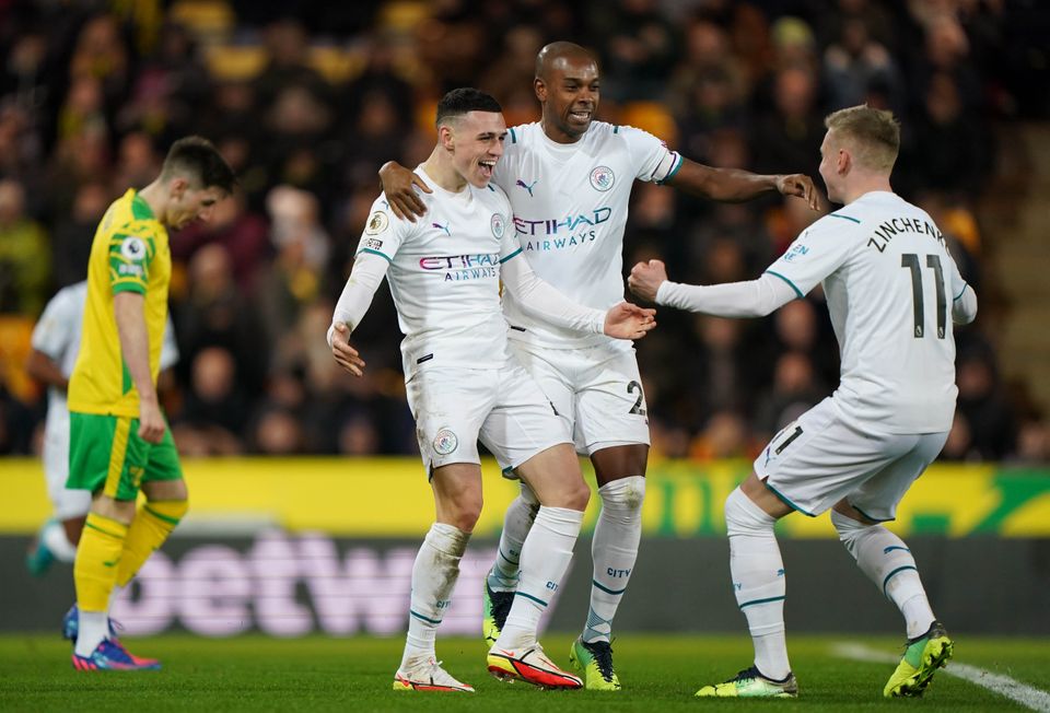 Phil Foden (third right) scored Manchester City’s second goal at Carrow Road (Joe Giddens/PA)