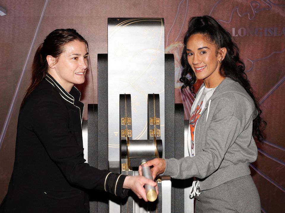 Katie Taylor and Amanda Serrano of Puerto Rico (right) participate in a lighting ceremony at the Empire State Building leading up to their World Lightweight title fight on Saturday. Photo: Sarah Stier/Getty Images