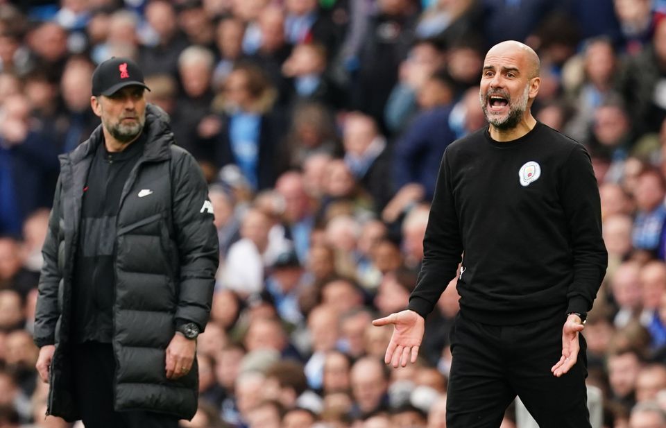 Pep Guardiola (right) and Jurgen Klopp saw their sides take the Premier League title race to the wire (Martin Rickett/PA)