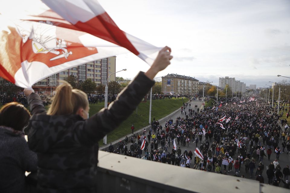 More than 50,000 people took part in the rally in Minsk, according to the Viasna human rights centre (AP)